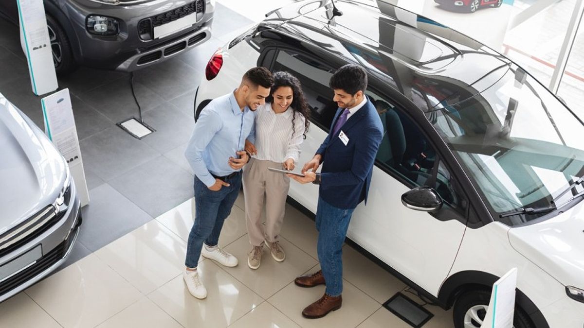 Customers looking to buy a car at dealer